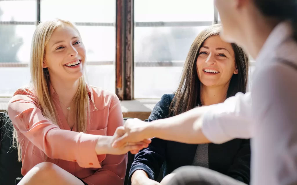 Businesswomen Handshake - RecyclingEnergy